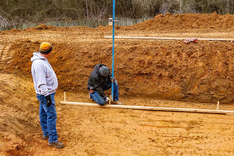 Setting the floor for Leisure Pools fiberglass swimming pool