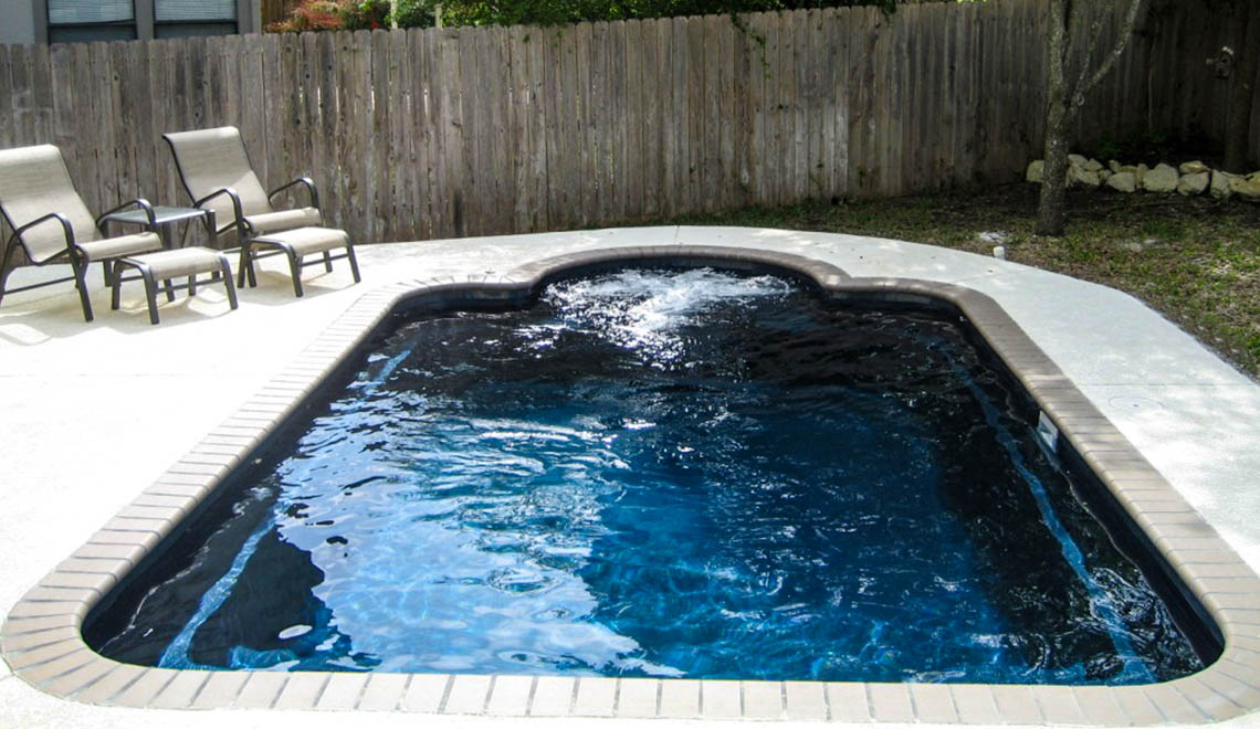 Leisure Pools Courtyard Roman inground fiberglass pool
