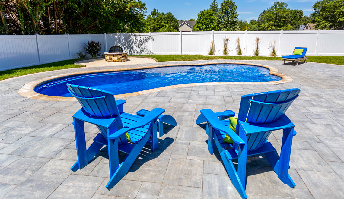 Leisure Pools Eclipse composite fiberglass swimming pool with built-in splash deck