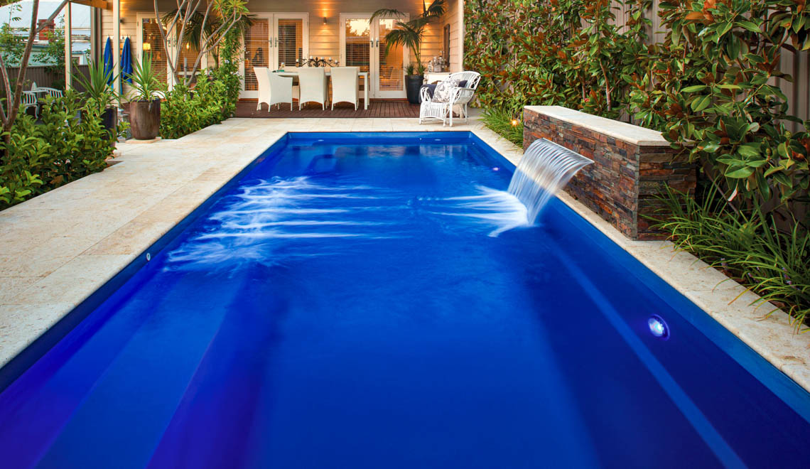 Leisure Pools Harmony composite swimming pool with full-length bench seat