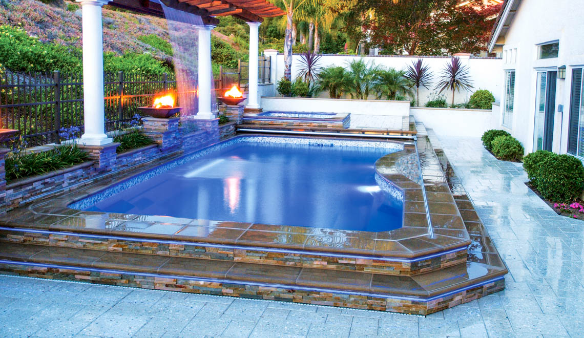Leisure Pools Moroccan large composite swimming pool with stairs and spa nook