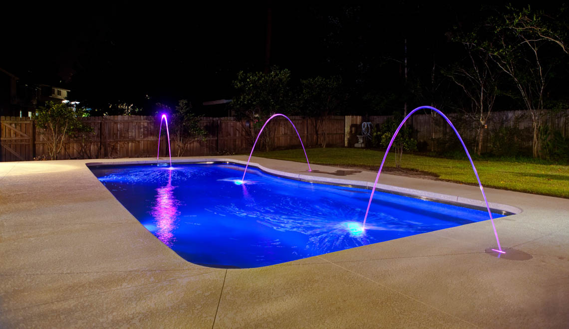 Leisure Pools Moroccan large in-ground swimming pool with stairs and spa nook