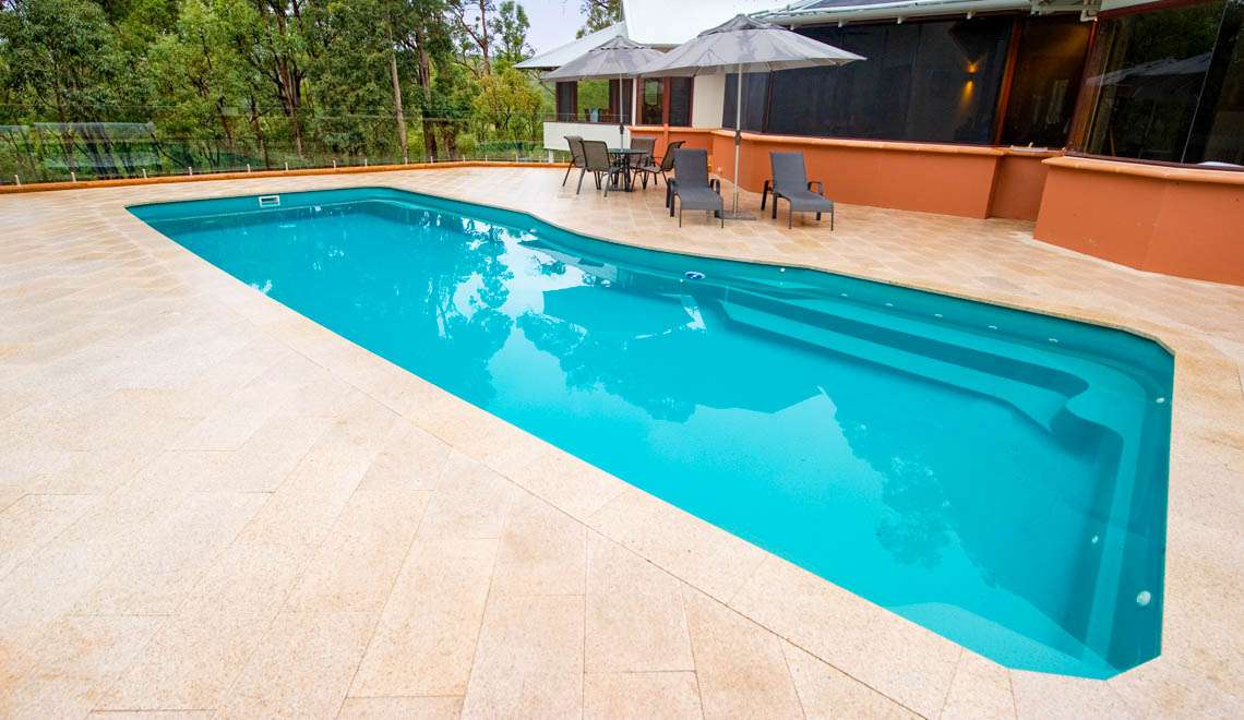 Leisure Pools Moroccan large composite swimming pool with stairs and spa nook