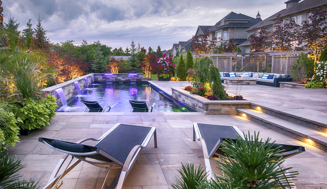 Leisure Pools Pinnacle large precast swimming pool with built-in splash deck
