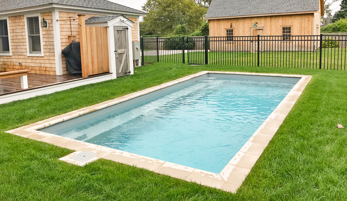 Leisure Pools Reflection composite fiberglass swimming pool with perimeter swimout