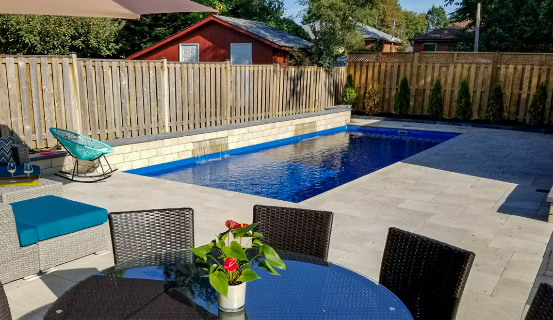 Leisure Pools Reflection composite swimming pool with perimeter swimout