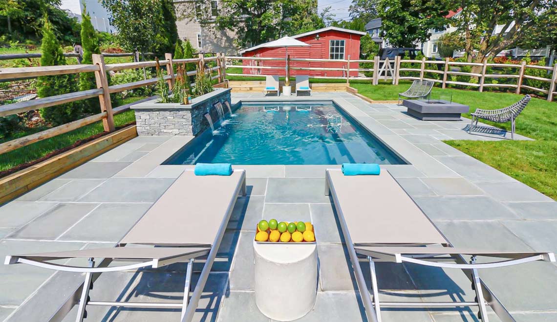 Leisure Pools Reflection composite fiberglass swimming pool with perimeter swimout