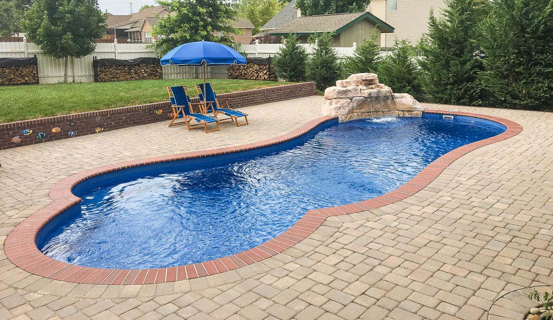 Leisure Pools Eclipse freeform fiberglass swimming pool
