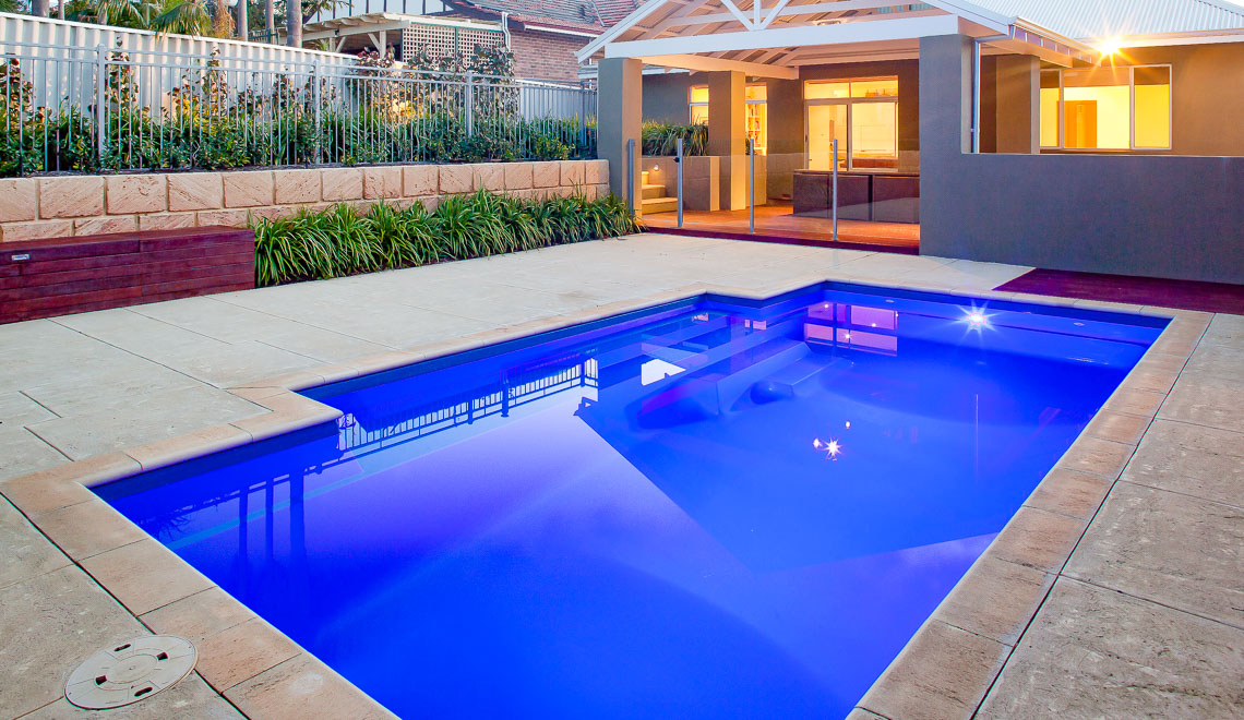 Leisure Pools Elegance fiberglass swimming pool with perimeter swimout