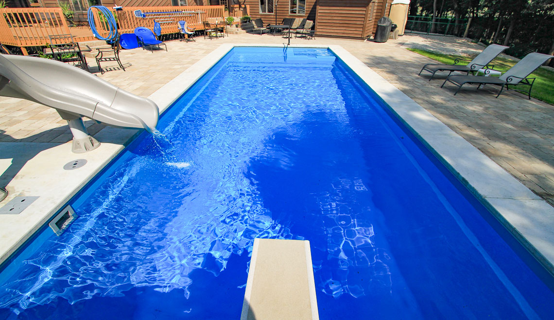 Leisure Pools Icon composite swimming pool with built-in spa and splash deck