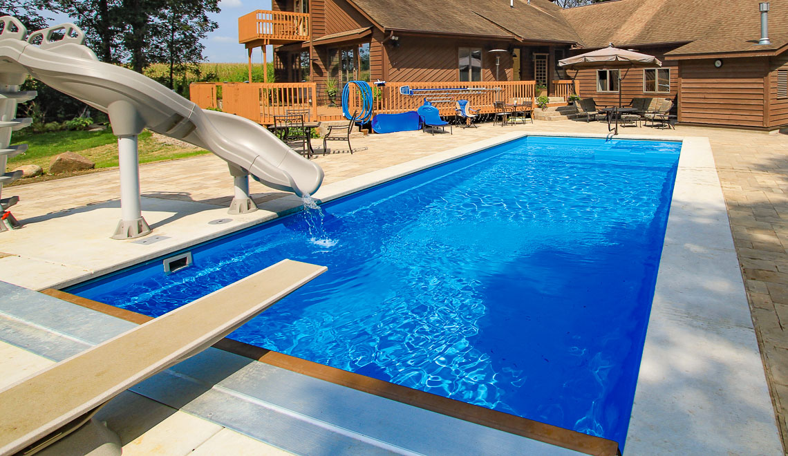 Leisure Pools Icon composite swimming pool with built-in spa and splash deck