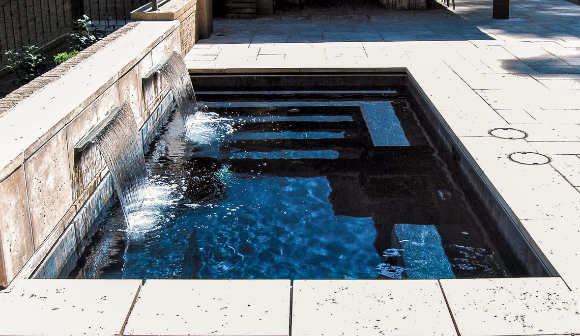 Leisure Pools Palladium Plunge precast composite swimming pool with built-in bench