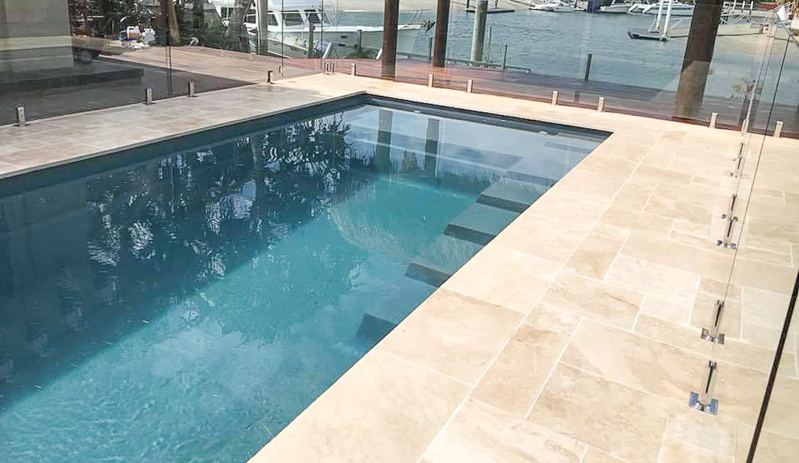 Leisure Pools Precision composite swimming pool with built-in splash deck