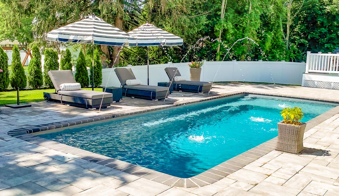Leisure Pools Reflection with Splash Desk composite fiberglass swimming pool