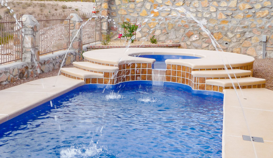 Leisure Pools Roman composite fiberglass swimming pool with spa nook and swimout