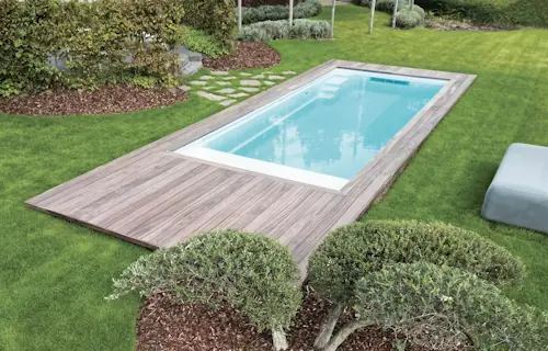 The Encore inground swimming pool model: maximized features. Compact design.