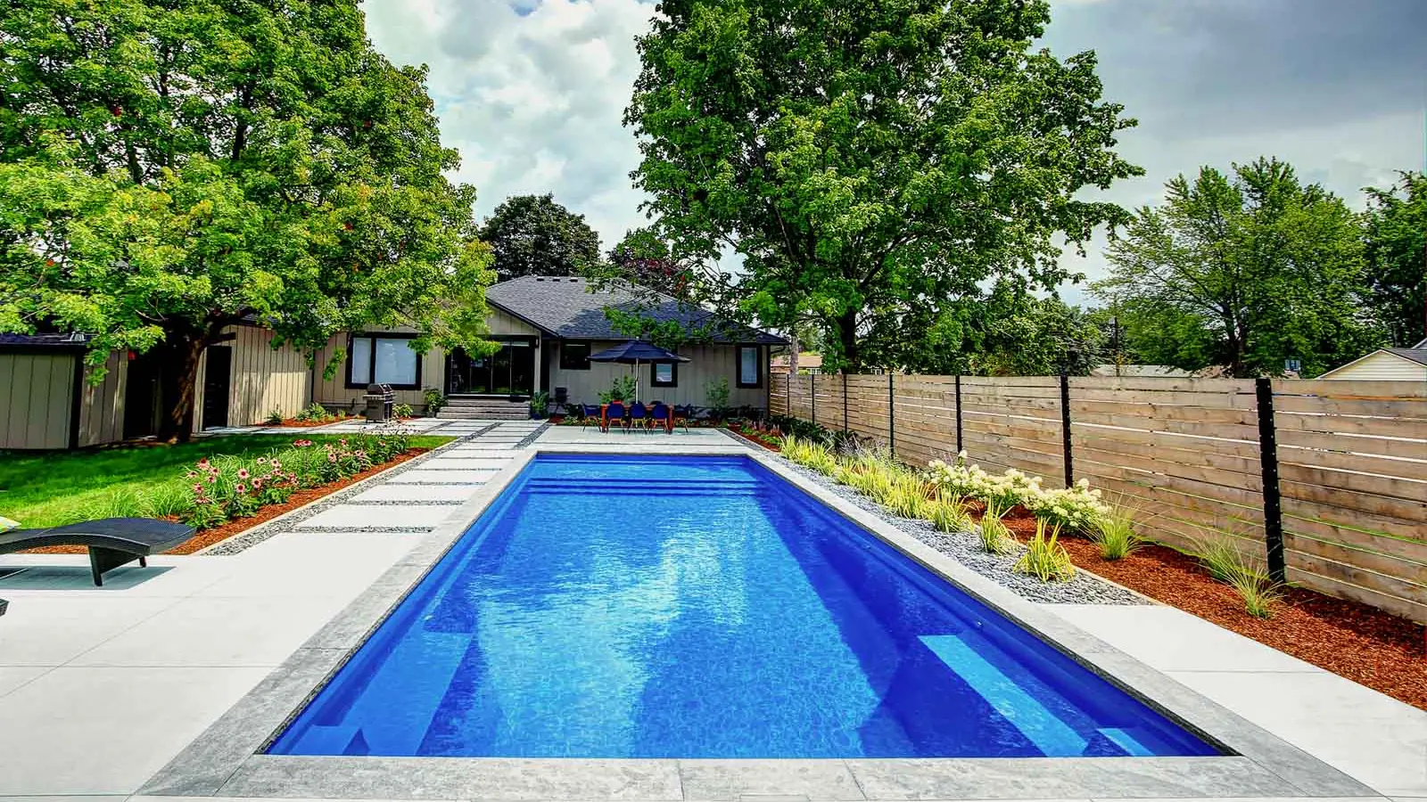 The Pinnacle, a fiberglass pool with a full width splash pad