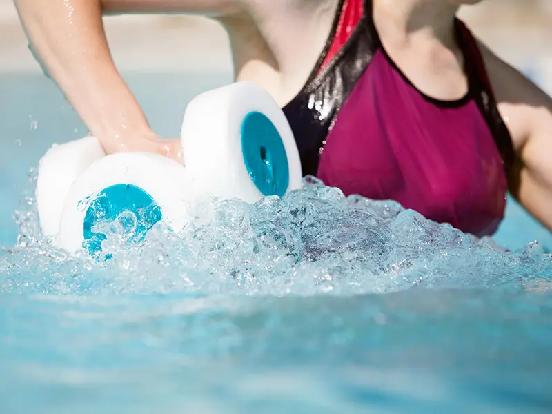 arm lists with weights in a fiberglass swimming pool